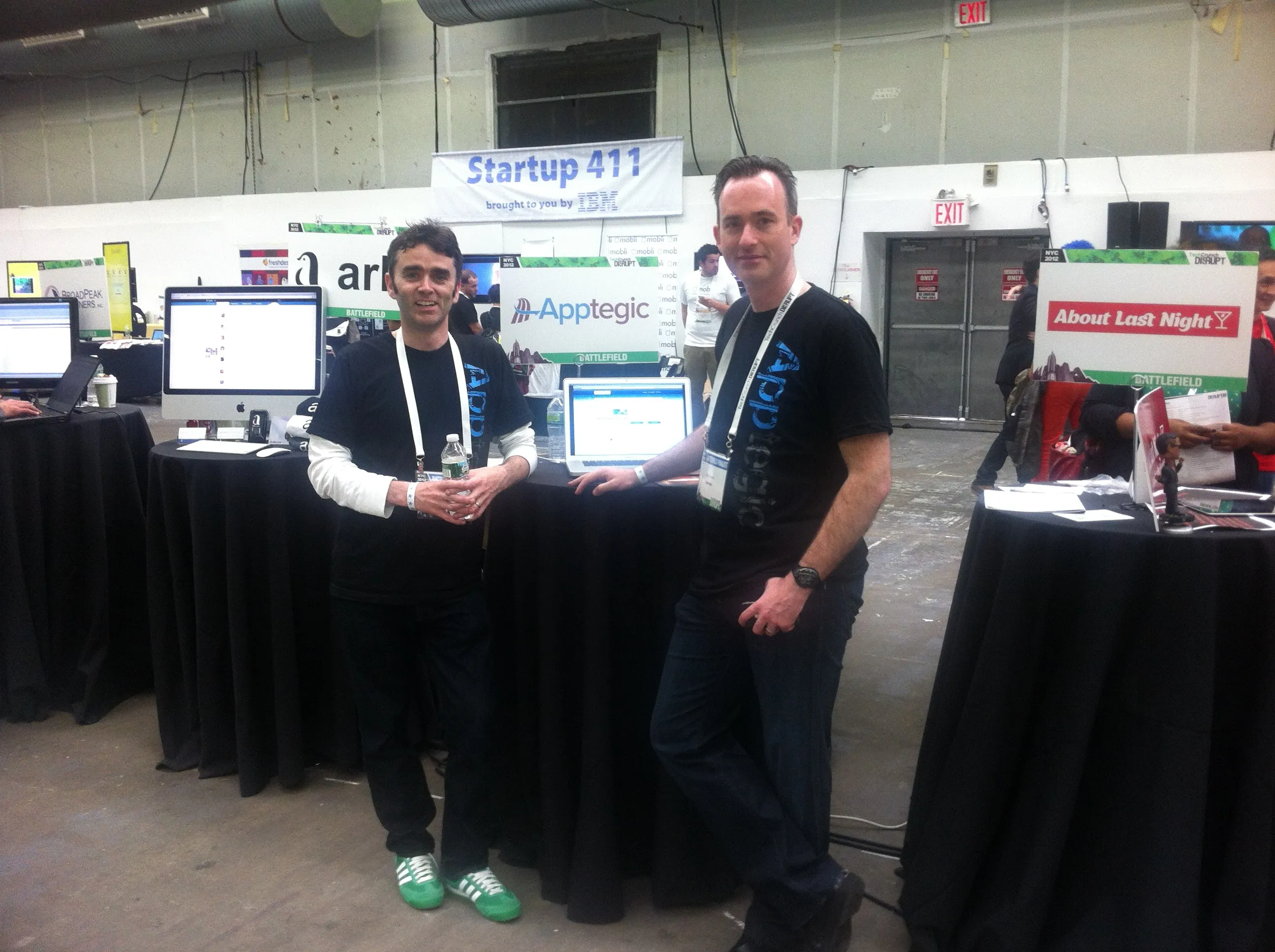 Gene at TechCrunch Disrupt startup booth with iMacs and Startup 411 banner, representing founding engineer era at Evergage
