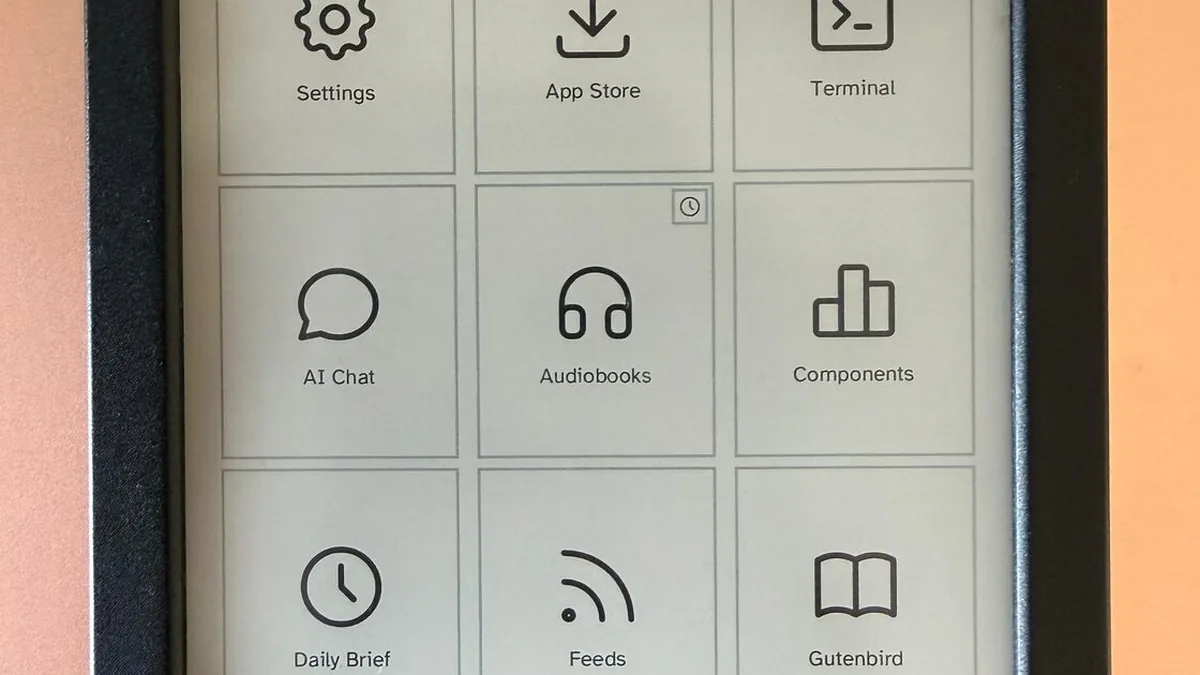 The Cobalt launcher on a Kobo Clara BW: Settings, App Store, Terminal, AI Chat, Audiobooks, Components, Daily Brief, Feeds and Gutenbird.