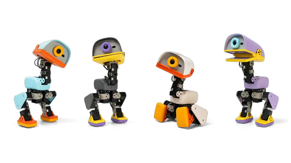 The four Microduck colourways - Cream, Graphite, Lavender, Sky - standing side by side on white